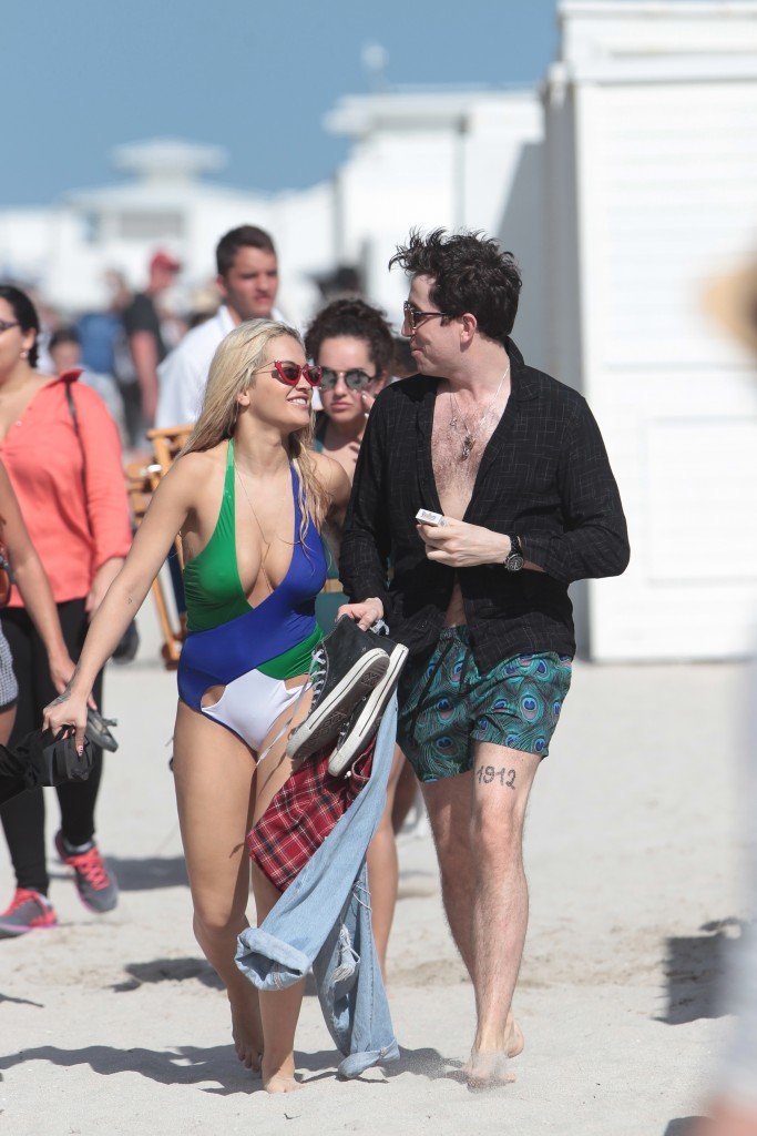 *** UK ONLY *** *** MAIL ONLINE OUT ***146298, Rita Ora and Daisy Lowe show off their bikini bodies on the beach in Miami. The British beauties appeared to be having a great time in their sexy one piece bathing suits as they splashed in the ocean. Rita's X Factor co-star Nick Grimshaw watched from the beach. Miami, Florida - Monday December 28, 2015. PHOTOGRAPH BY Pacific Coast News / Barcroft Media UK Office, London. T +44 845 370 2233 W www.barcroftmedia.com USA Office, New York City. T +1 212 796 2458 W www.barcroftusa.com Indian Office, Delhi. T +91 11 4053 2429 W www.barcroftindia.com